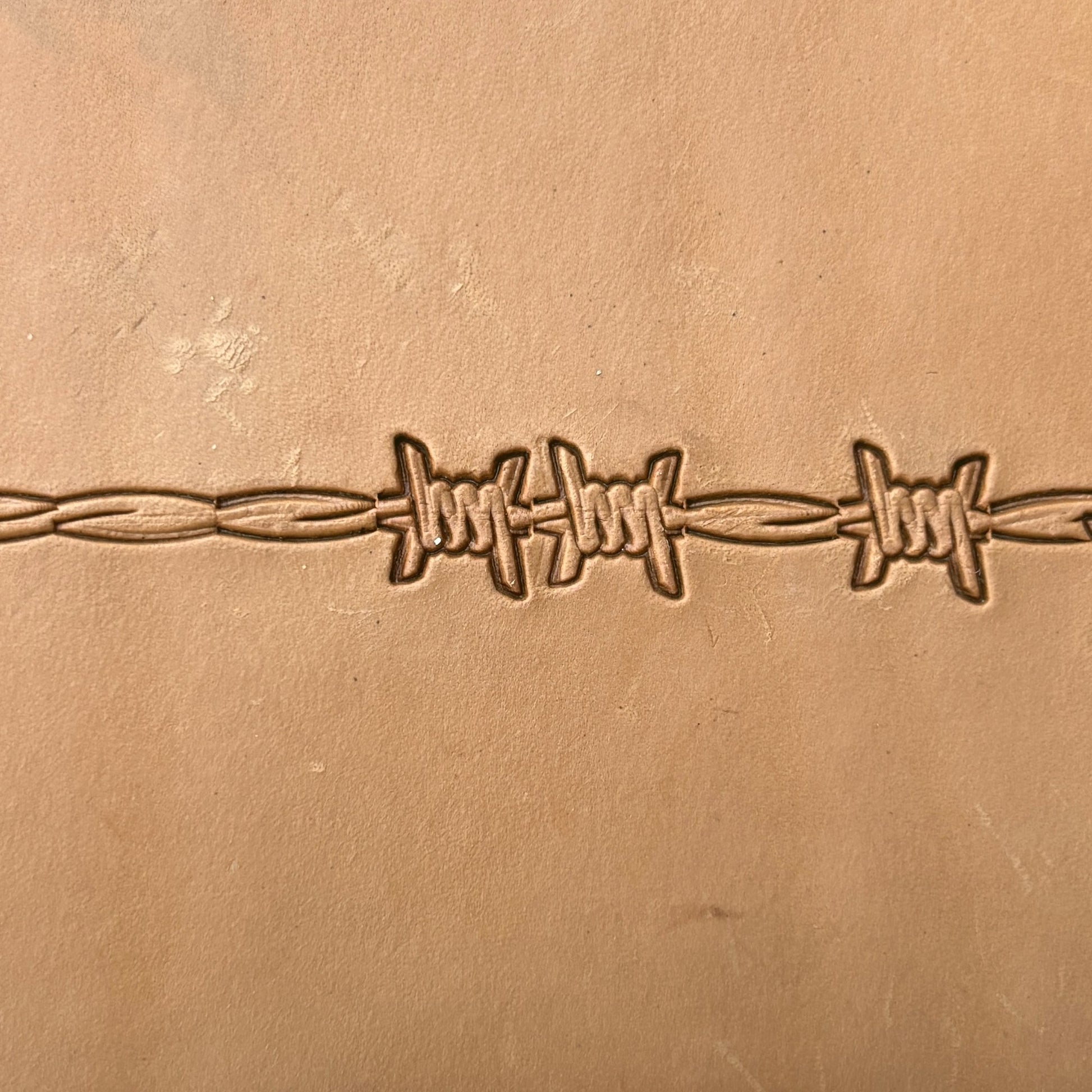 Barbed Wire leather stamp LT335 — pattern imprint on veg-tan leather
