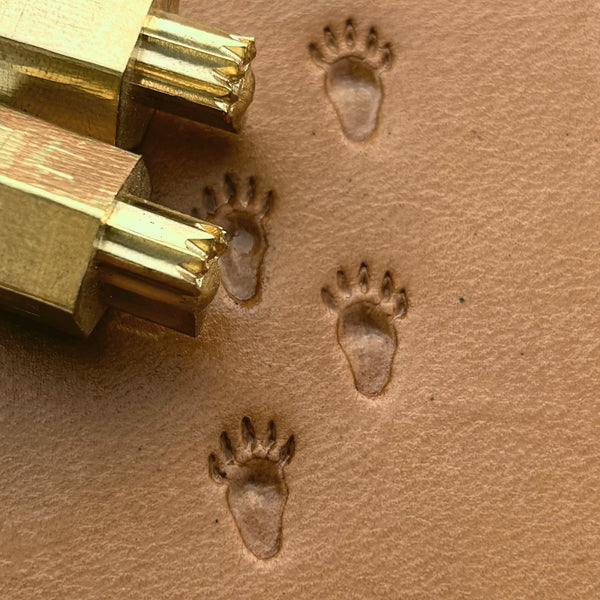 Tracks Paw Bear leather stamp LT336 — brass stamping tool with imprint on natural veg-tan leather