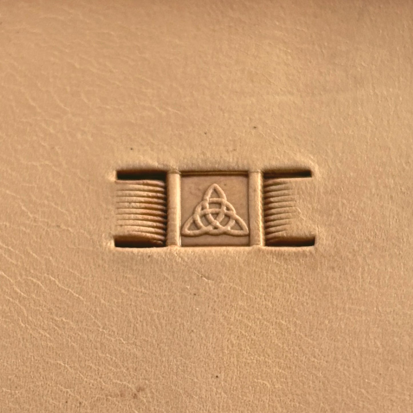 Basket Weave leather stamp LT340 — single impression on veg-tan leather