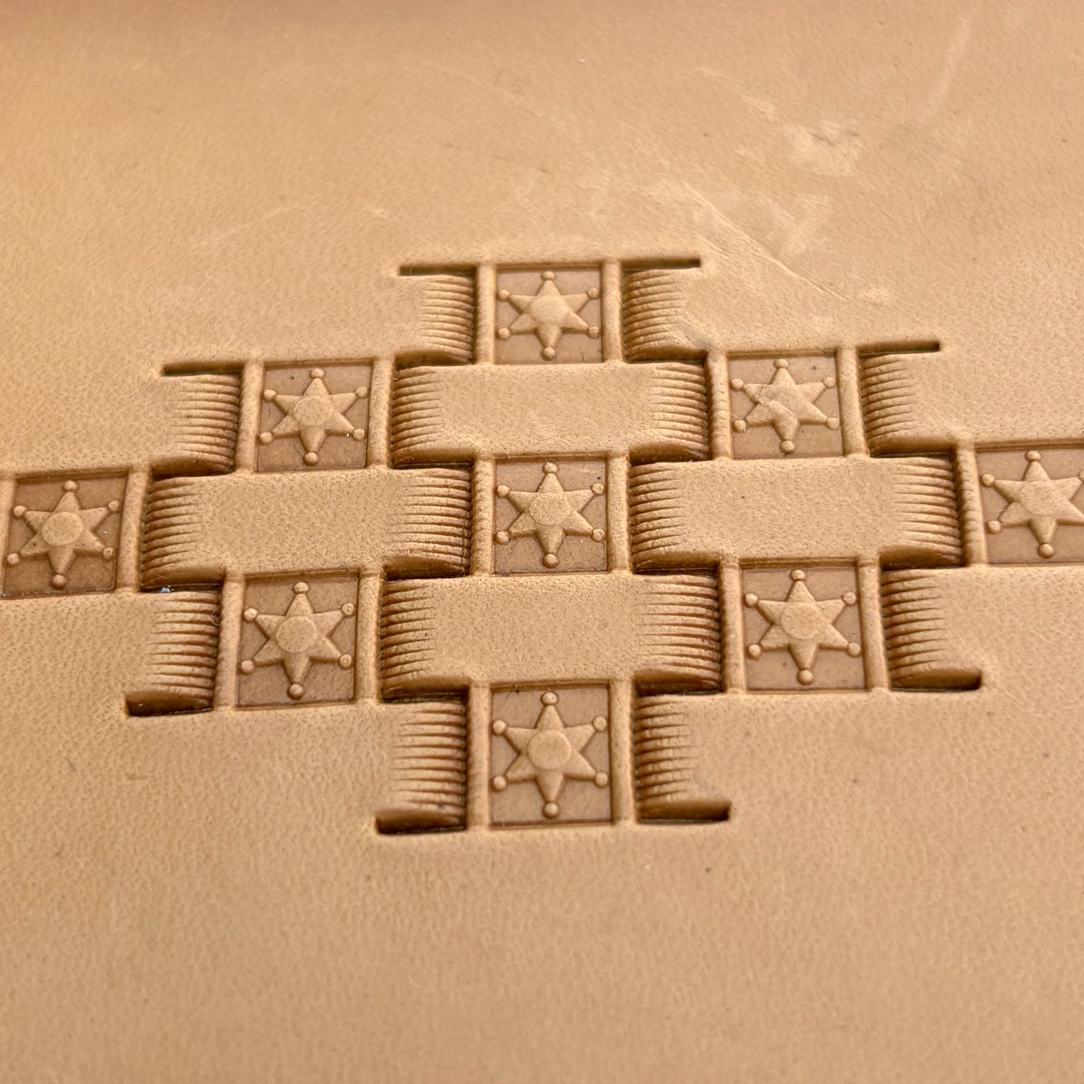 Basket Weave leather stamp LT341 — single impression on veg-tan leather
