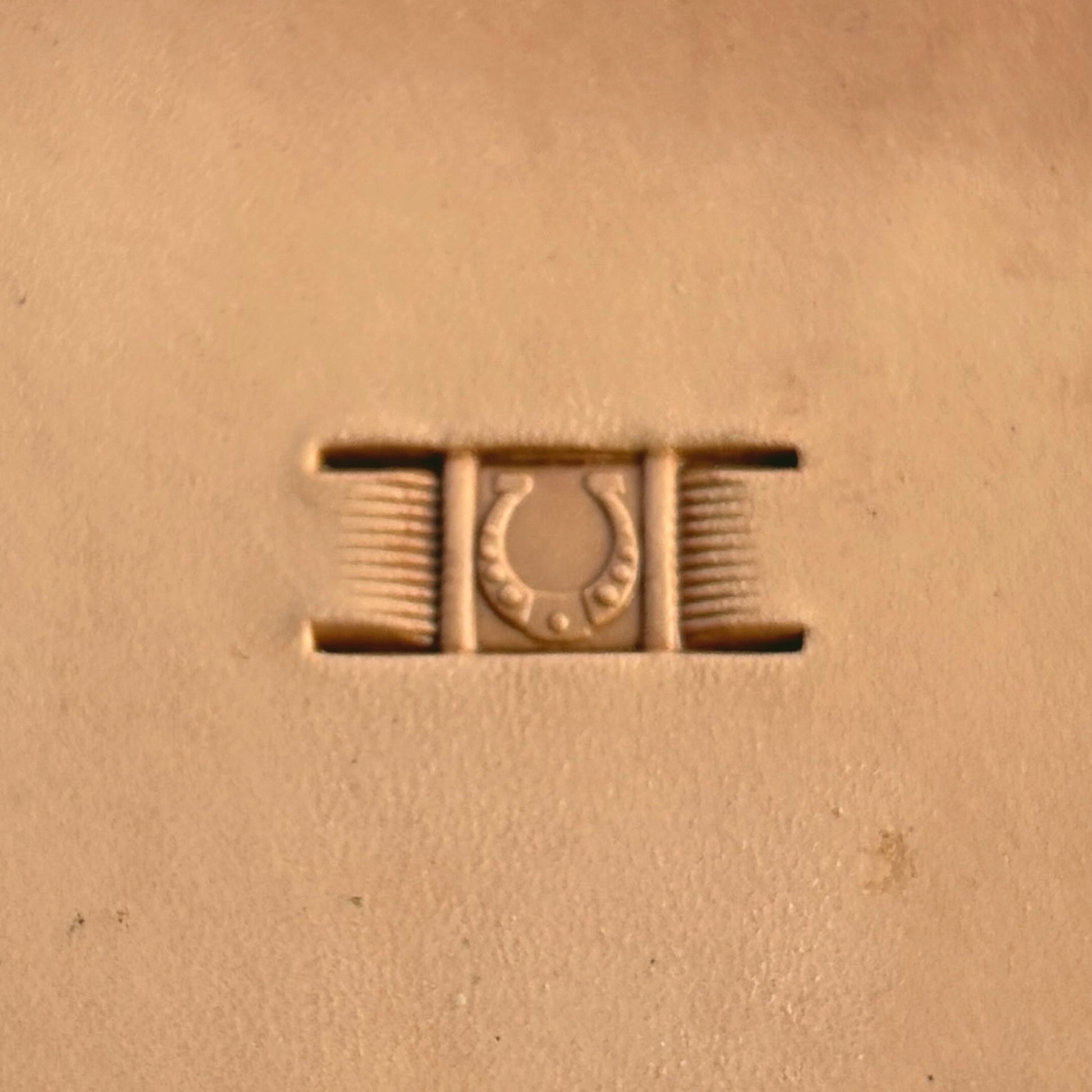 Basket Weave leather stamp LT342 — single impression on veg-tan leather