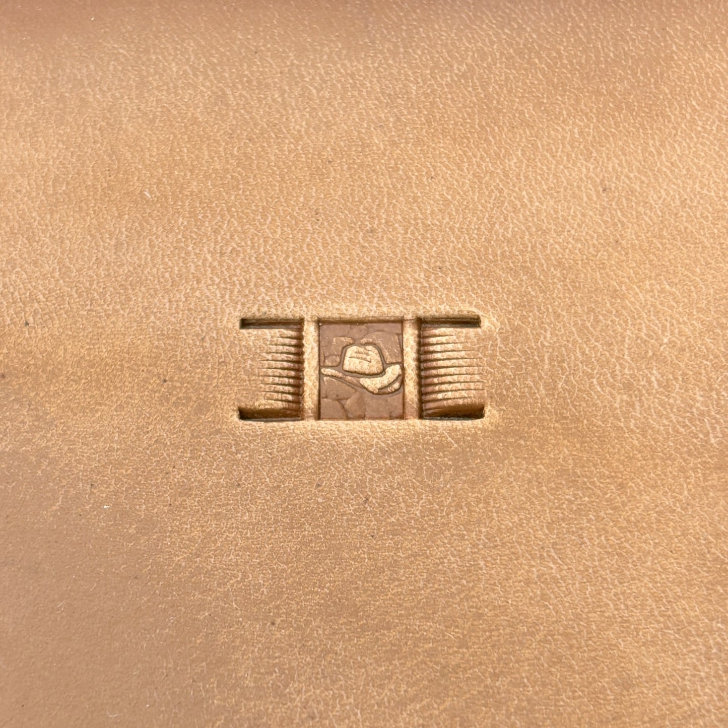 Cowboy Rug Basket Weave leather stamp LT343 — single impression on veg-tan leather
