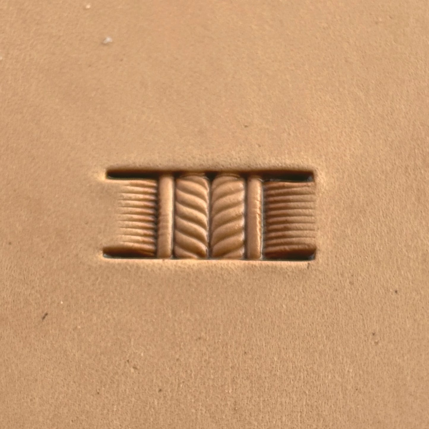 Basket Weave leather stamp LT345 — single impression on veg-tan leather