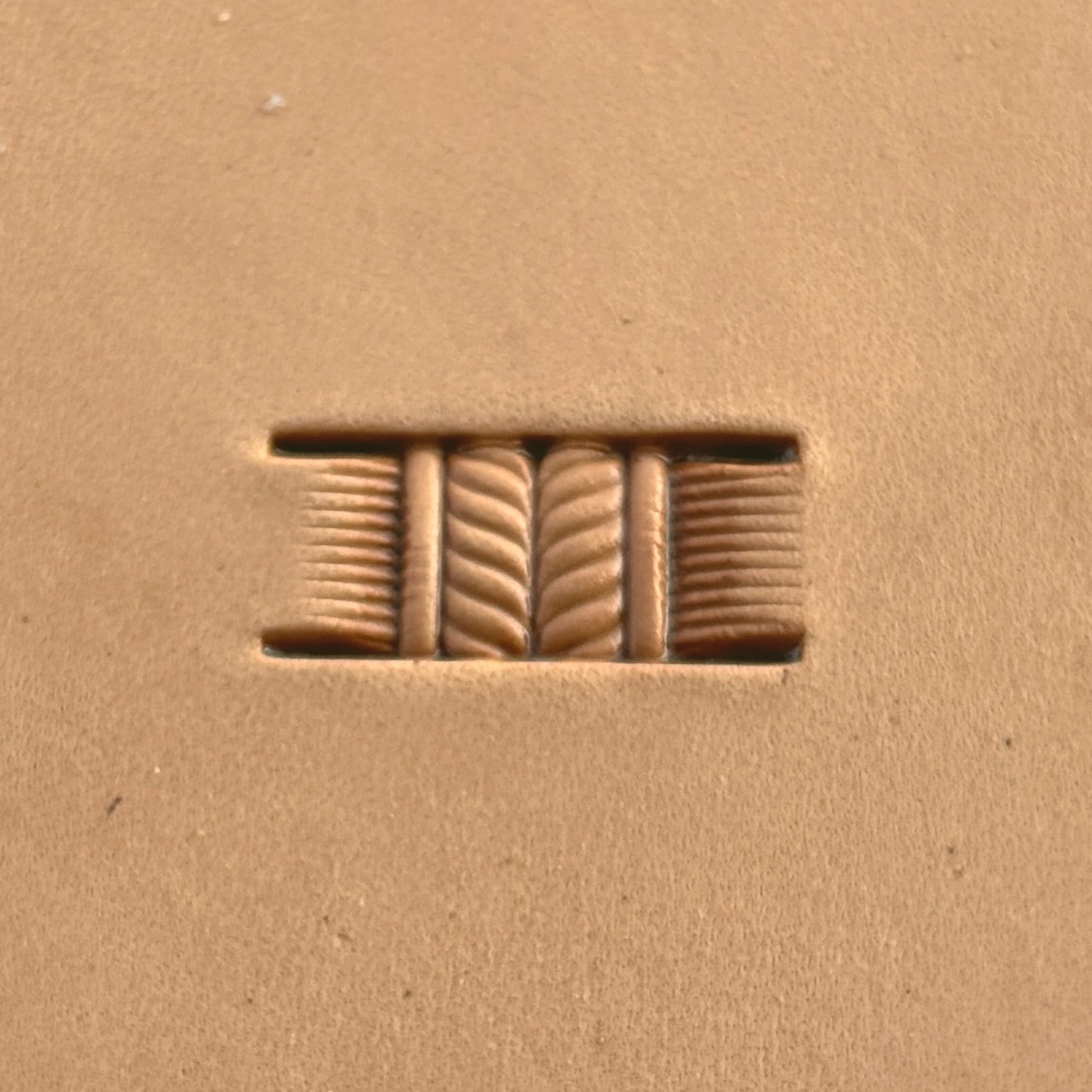Basket Weave leather stamp LT345 — single impression on veg-tan leather