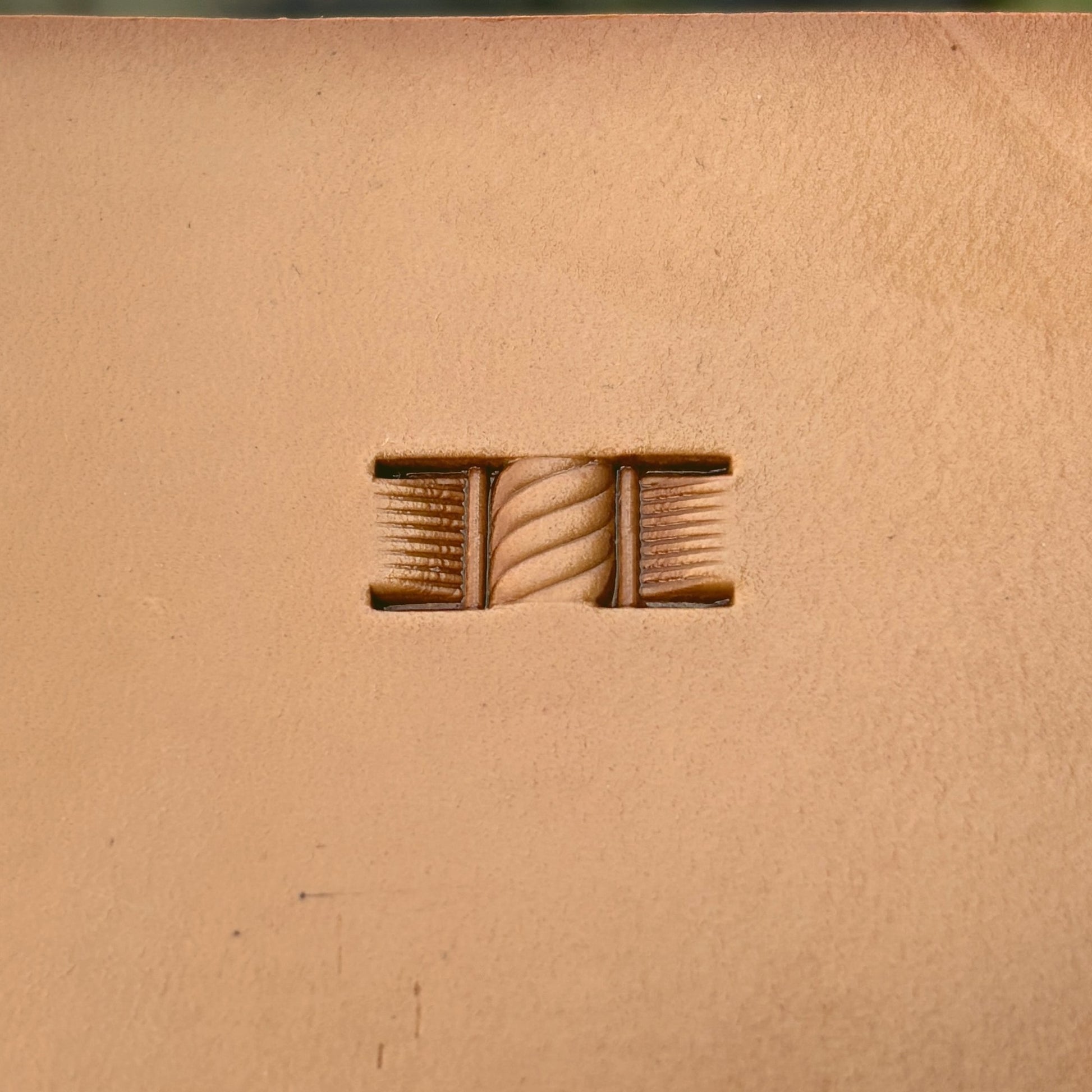 Diamond Shape Basket Weave leather stamp LT347 — single impression on veg-tan leather