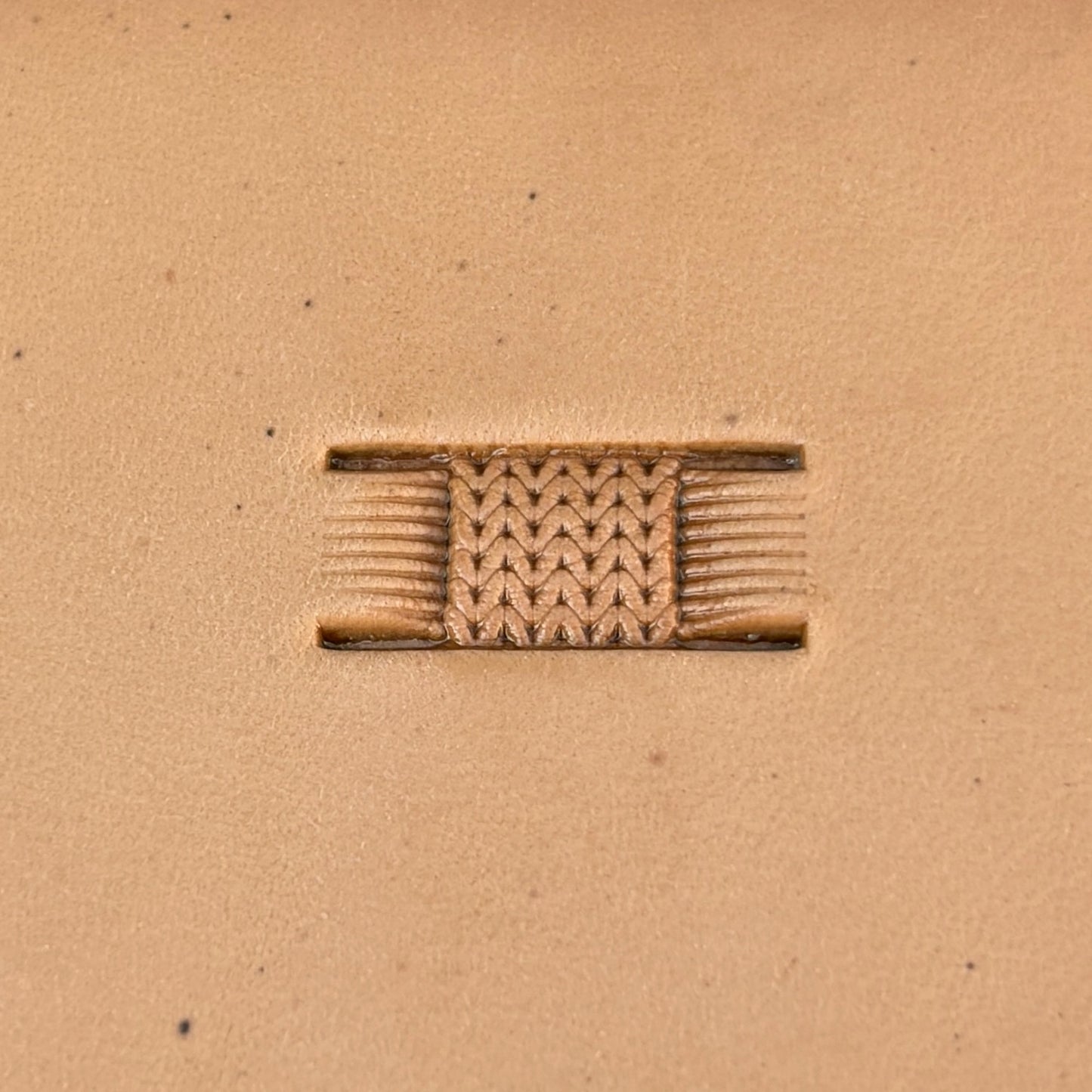 Basket Weave leather stamp LT348 — single impression on veg-tan leather