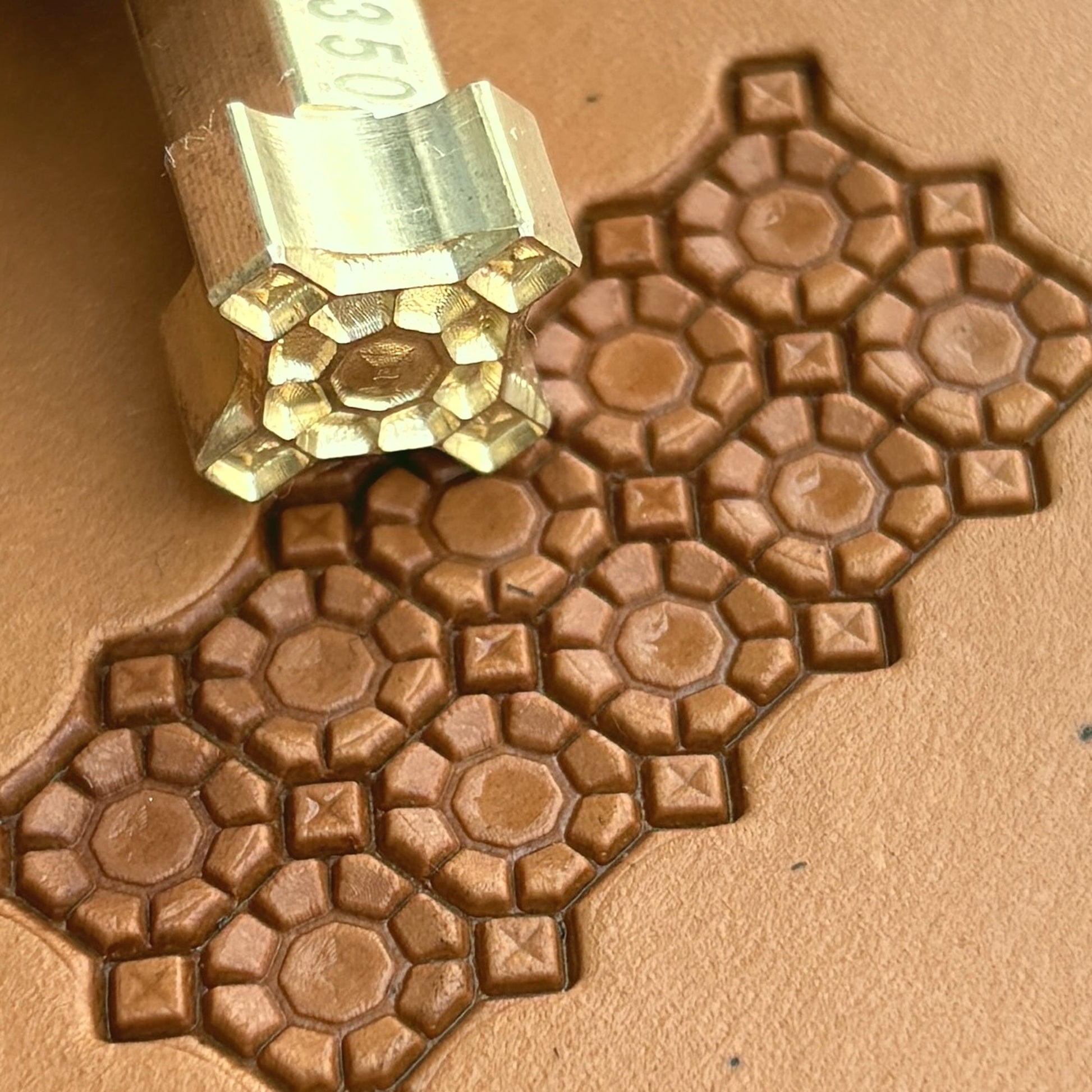 Geometric leather stamp LT350 — brass stamping tool with imprint on natural veg-tan leather