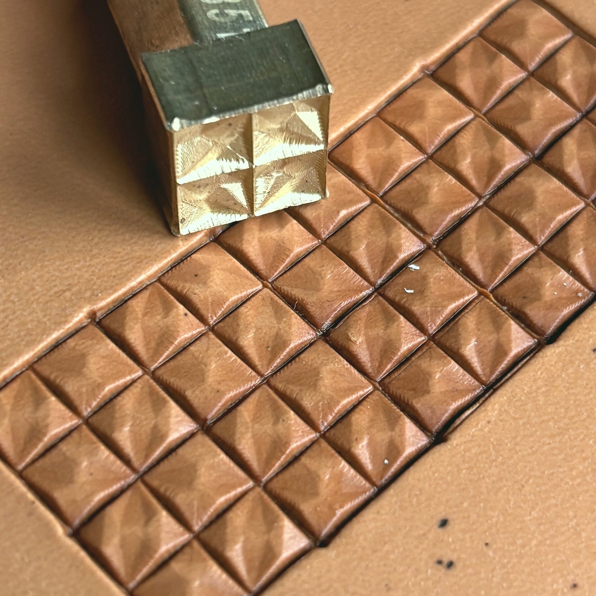Geometric leather stamp LT351 — brass stamping tool with imprint on natural veg-tan leather