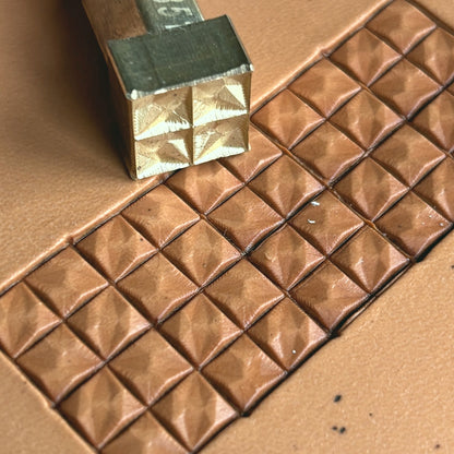 Geometric leather stamp LT351 — brass stamping tool with imprint on natural veg-tan leather