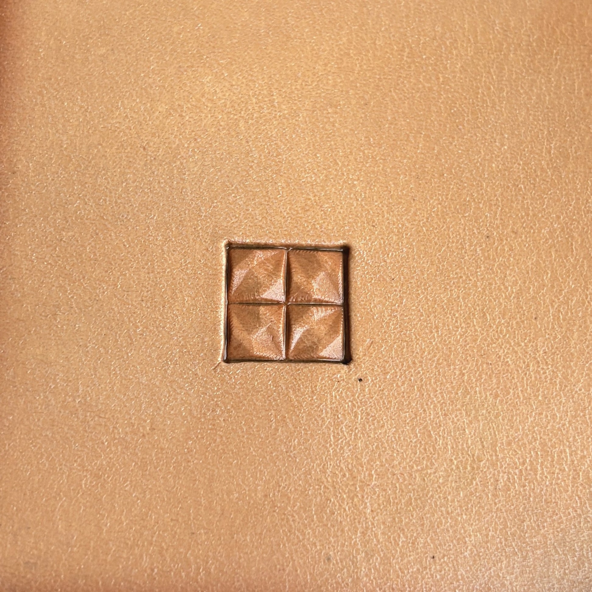 Geometric leather stamp LT351 — single impression on veg-tan leather