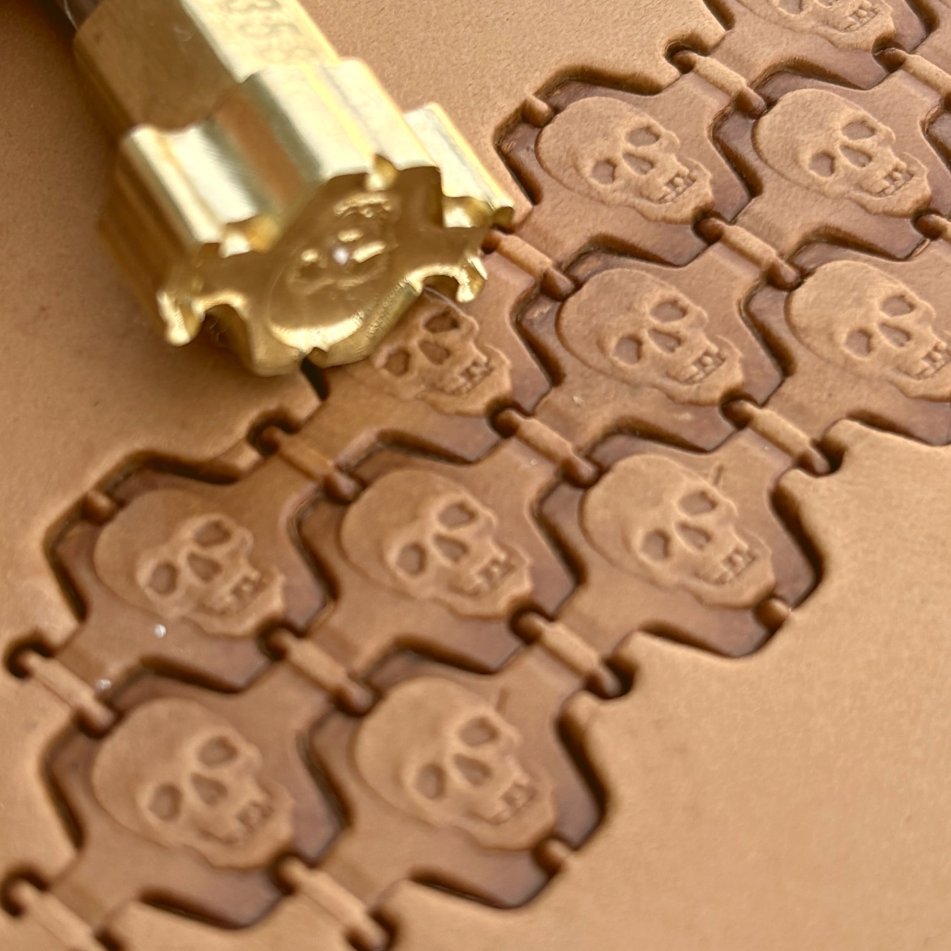 Skull leather stamp LT358 — brass stamping tool with imprint on natural veg-tan leather