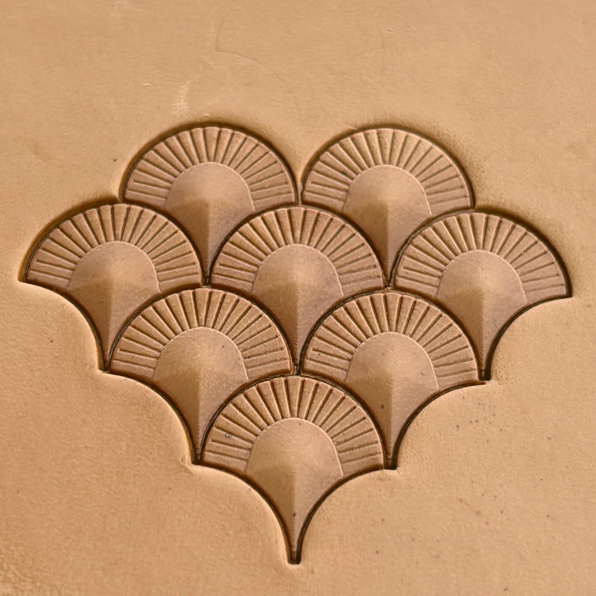 Geometric leather stamp LT359 — single impression on veg-tan leather