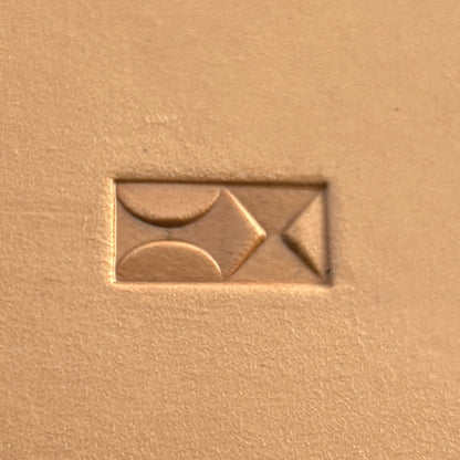 Geometric leather stamp LT360 — single impression on veg-tan leather