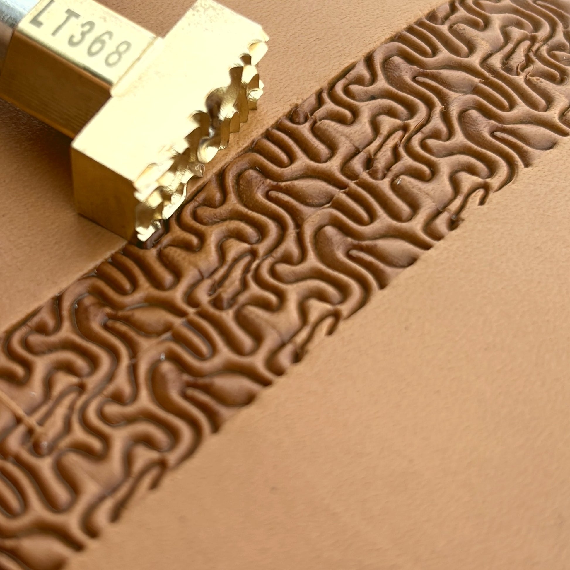 Maze Lines leather stamp LT368 — brass stamping tool with imprint on natural veg-tan leather