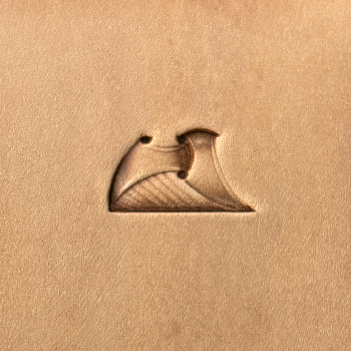 Curved Tiles Geometric leather stamp LT371 — single impression on veg-tan leather