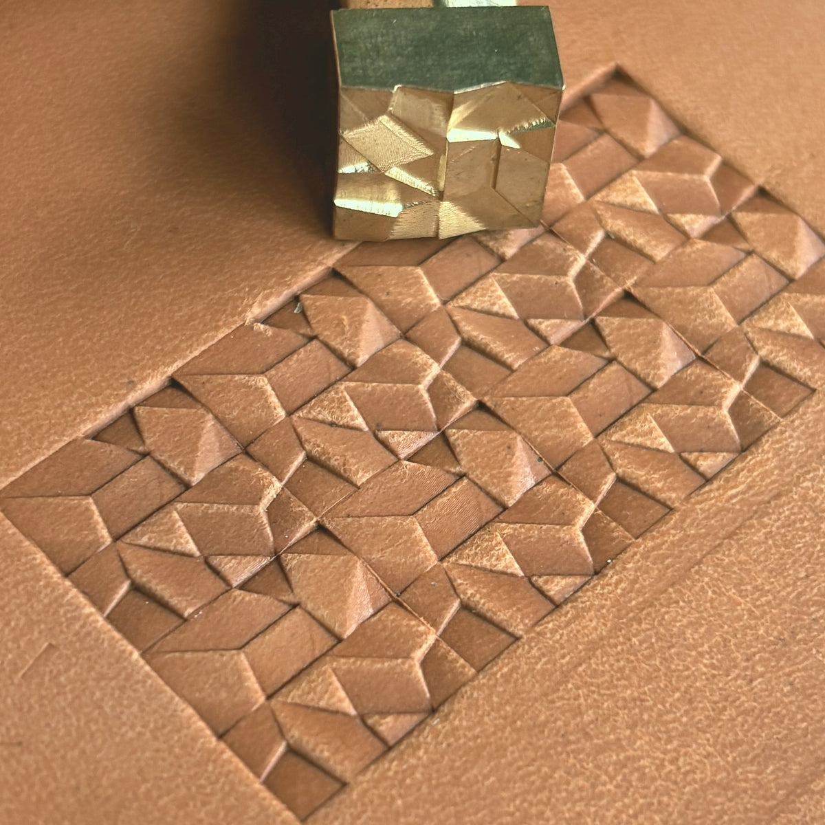 Geometric leather stamp LT374 — brass stamping tool with imprint on natural veg-tan leather