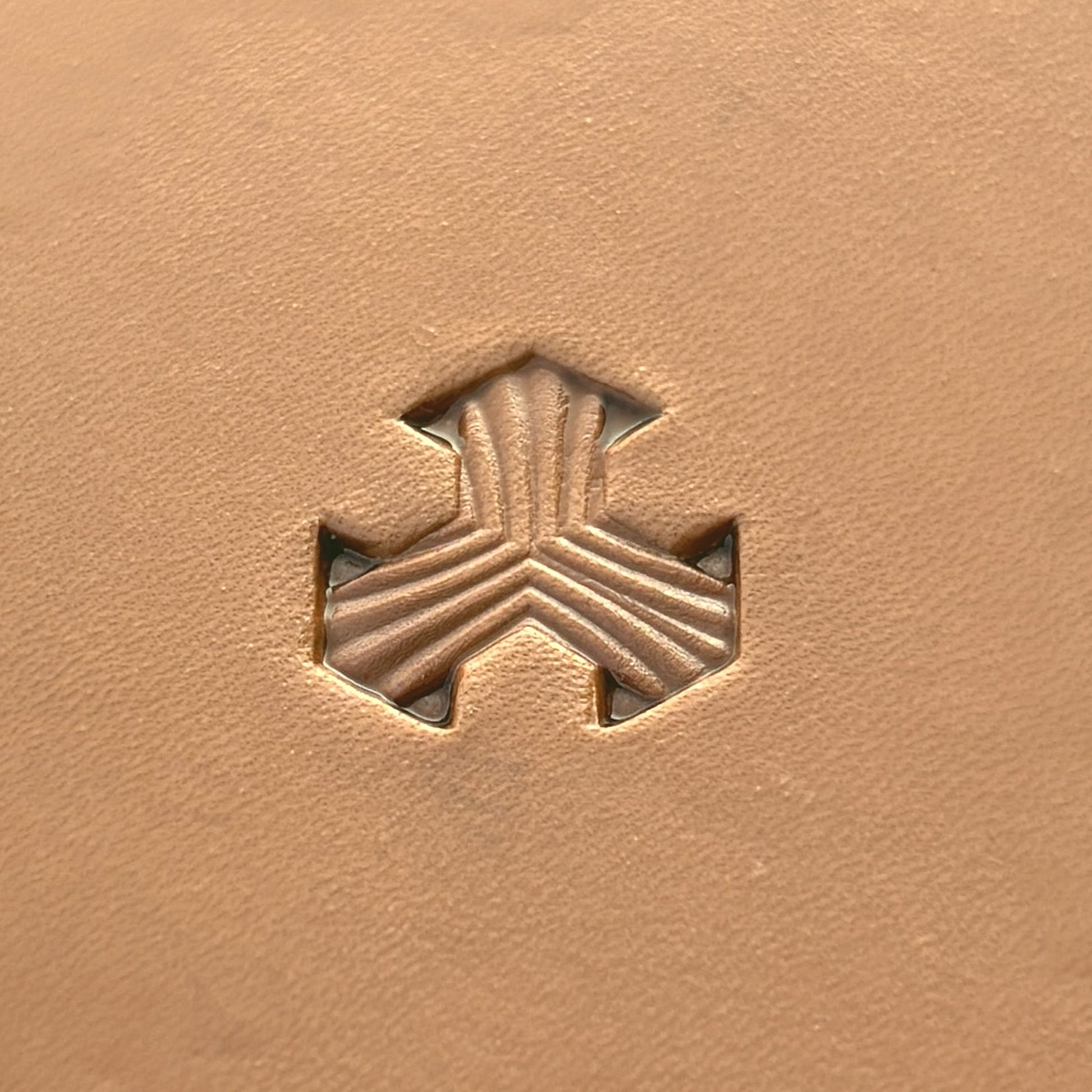 Geometric leather stamp LT378 — single impression on veg-tan leather