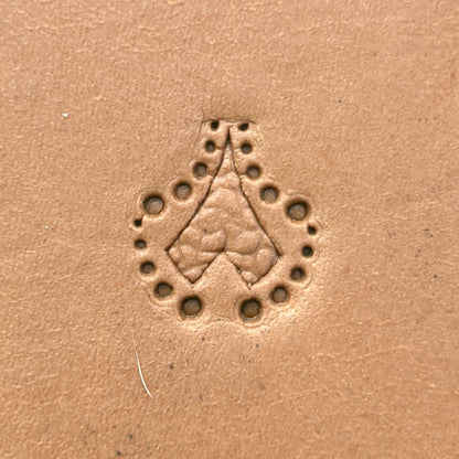 Dotted Motif Heart leather stamp LT380 — single impression on veg-tan leather