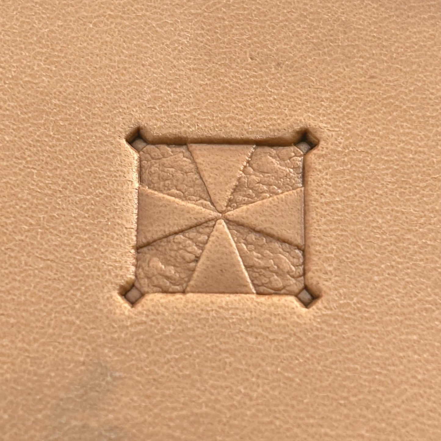 Geometric leather stamp LT382 — single impression on veg-tan leather