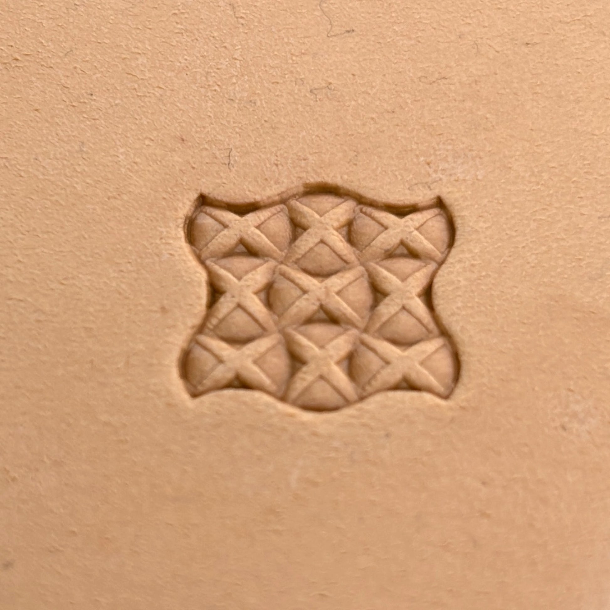Cross Lattice leather stamp LT387 — single impression on veg-tan leather
