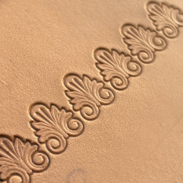Flourish Motif leather stamp LT392 — imprint on natural veg-tan leather