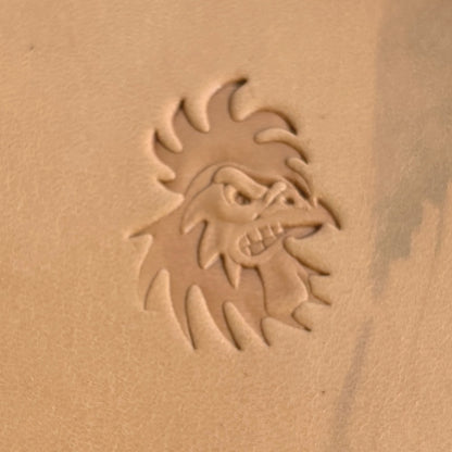 Fierce Rooster Head leather stamp LT393 — single impression on veg-tan leather