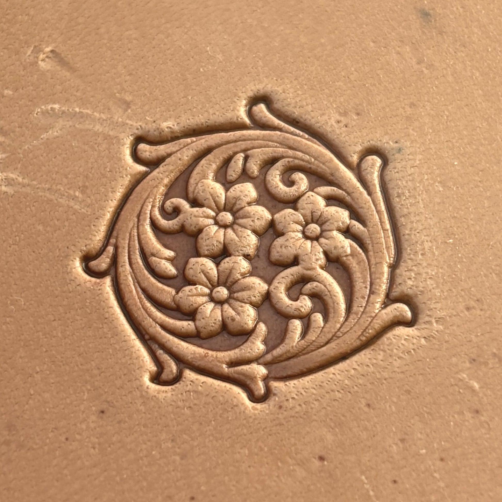 Flower leather stamp LT397 — single impression on veg-tan leather