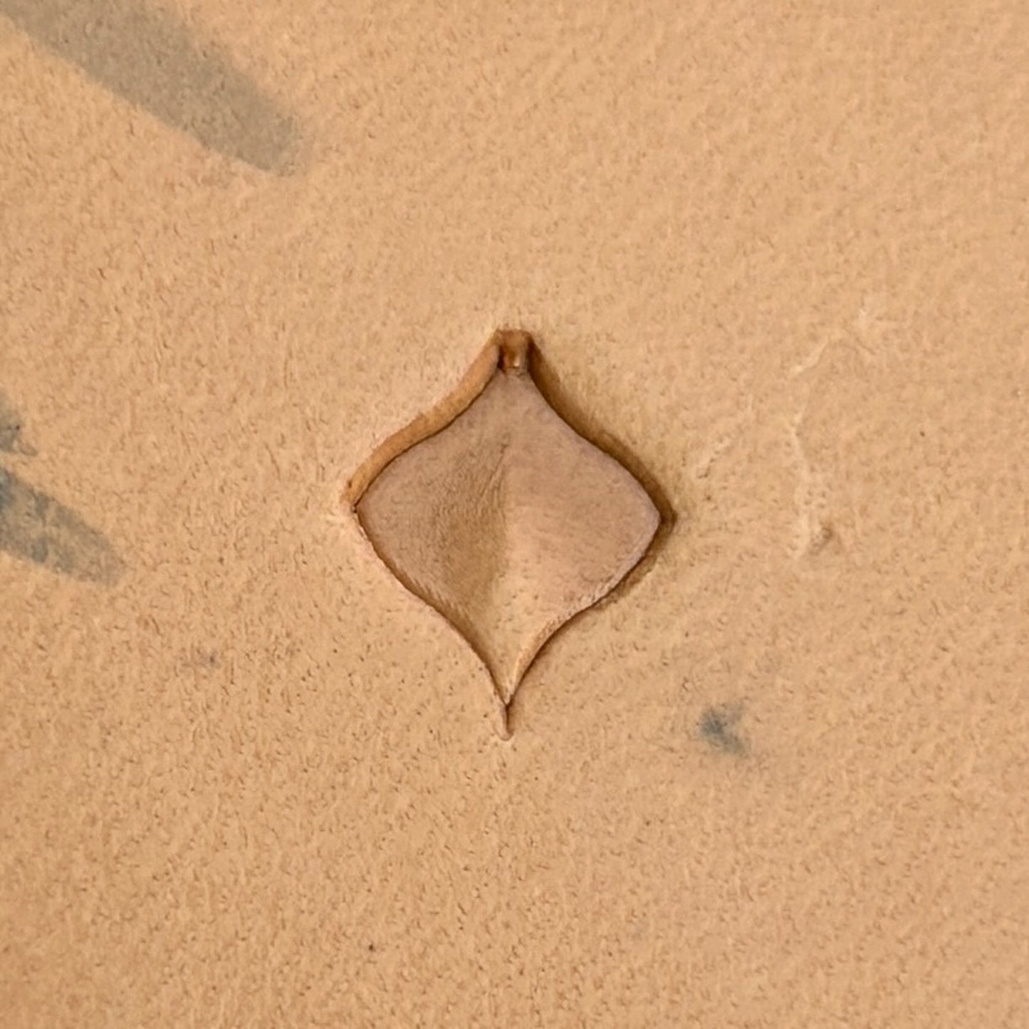 Diamond Grid leather stamp LT401 — brass stamping tool with imprint on natural veg-tan leather