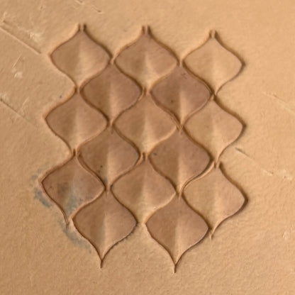 Diamond Grid leather stamp LT401 — single impression on veg-tan leather
