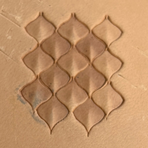 Diamond Grid leather stamp LT401 — single impression on veg-tan leather