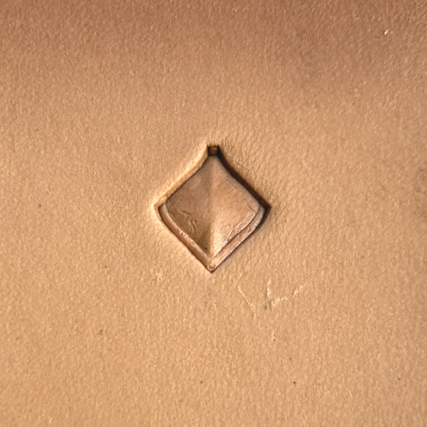 Geometric leather stamp LT402 — pattern imprint on veg-tan leather