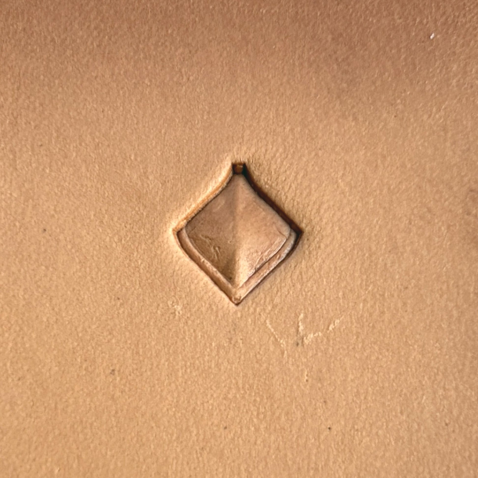 Geometric leather stamp LT402 — pattern imprint on veg-tan leather