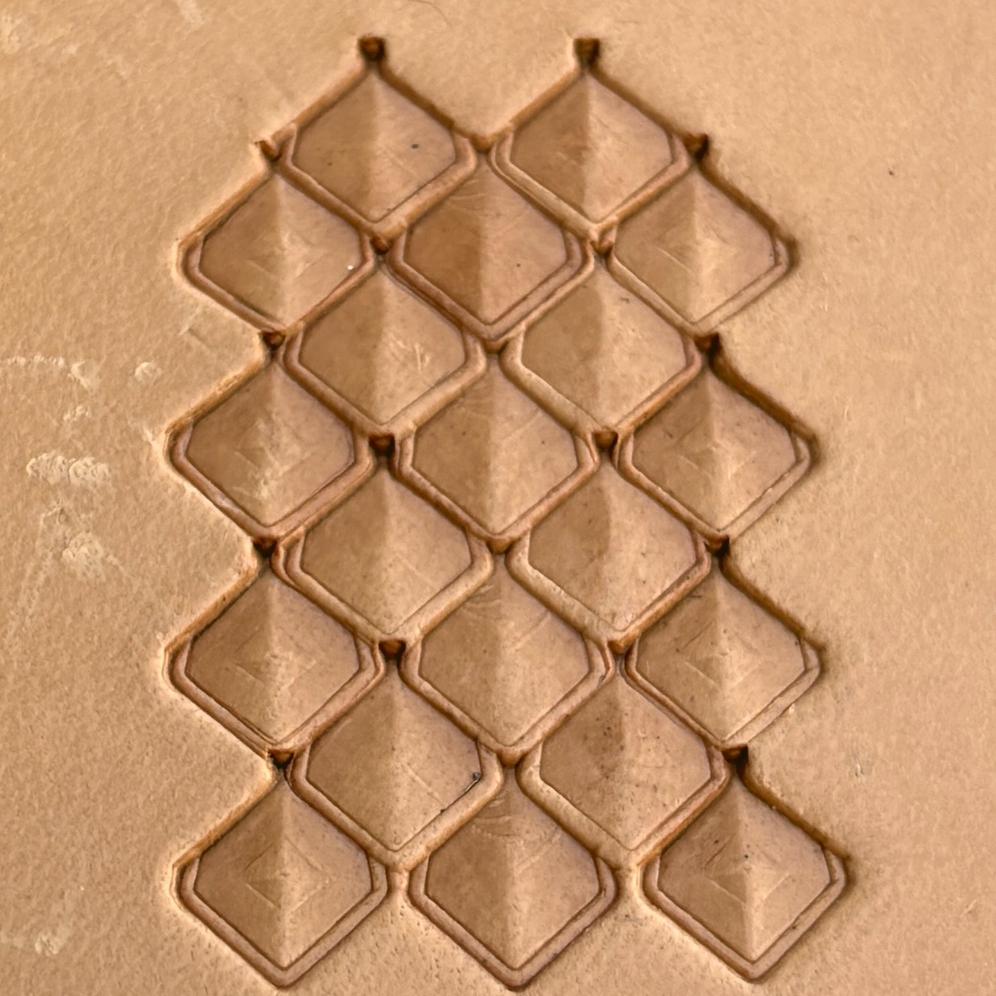 Geometric leather stamp LT404 — pattern imprint on veg-tan leather