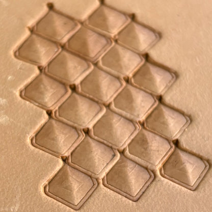 Geometric leather stamp LT404 — single impression on veg-tan leather