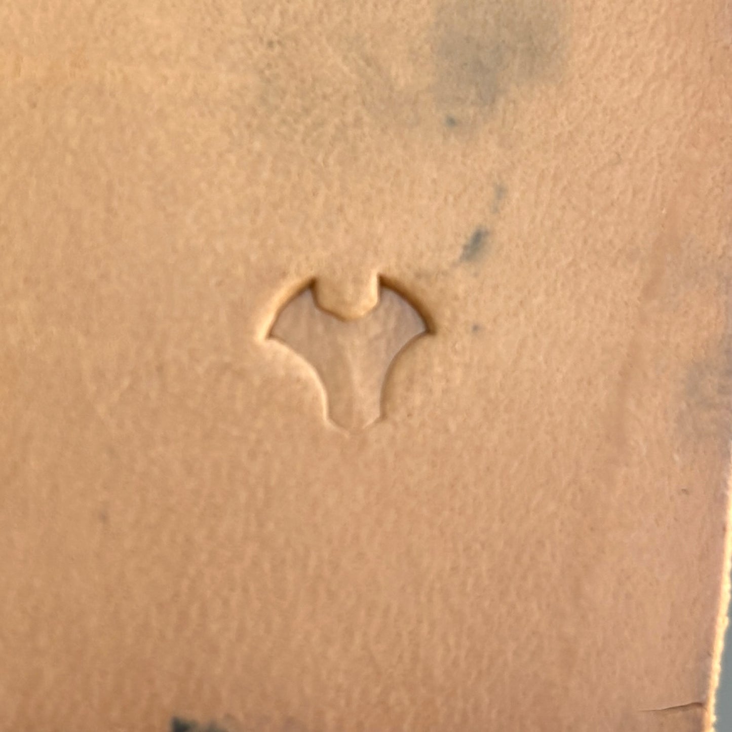 Geometric leather stamp LT406 — single impression on veg-tan leather