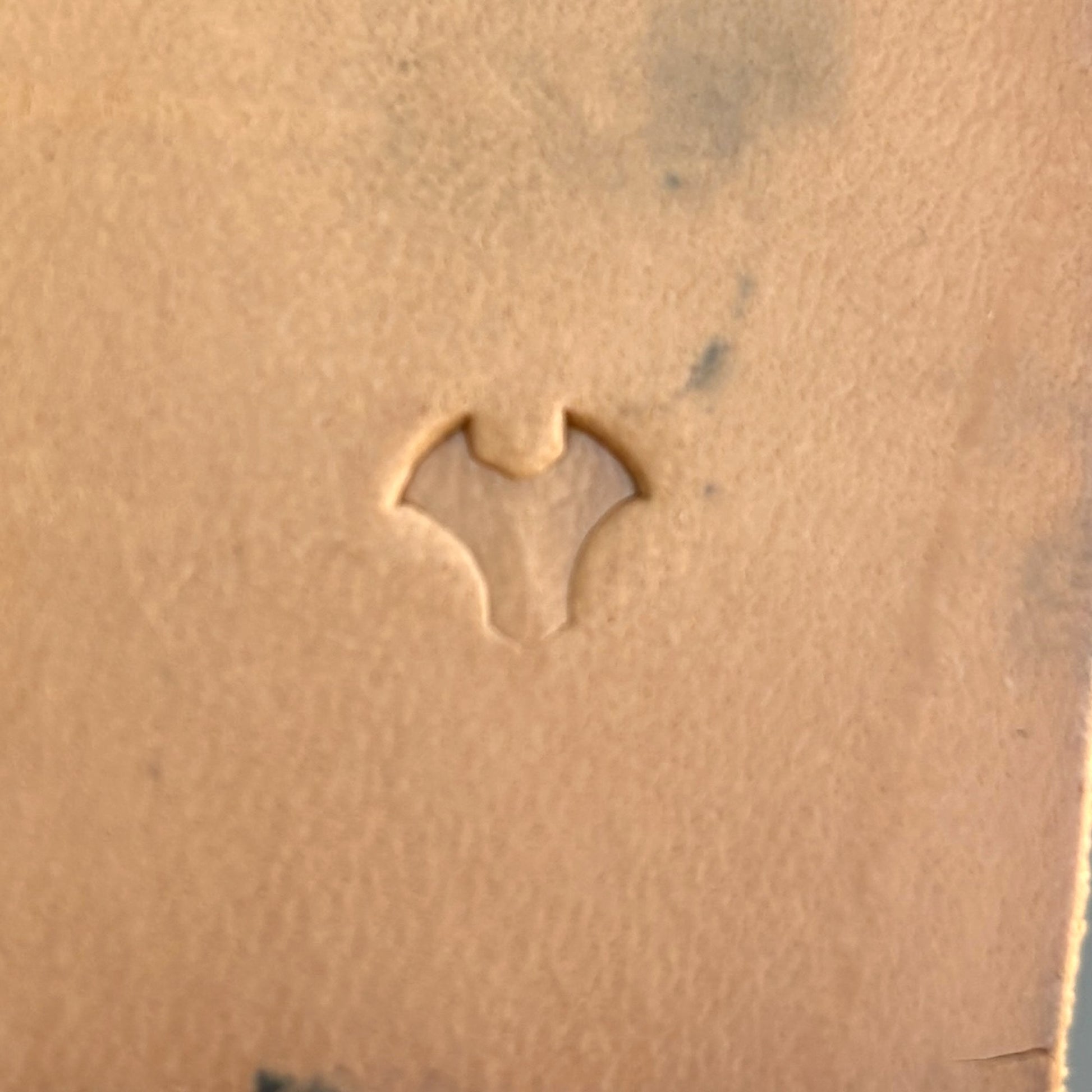 Geometric leather stamp LT406 — single impression on veg-tan leather