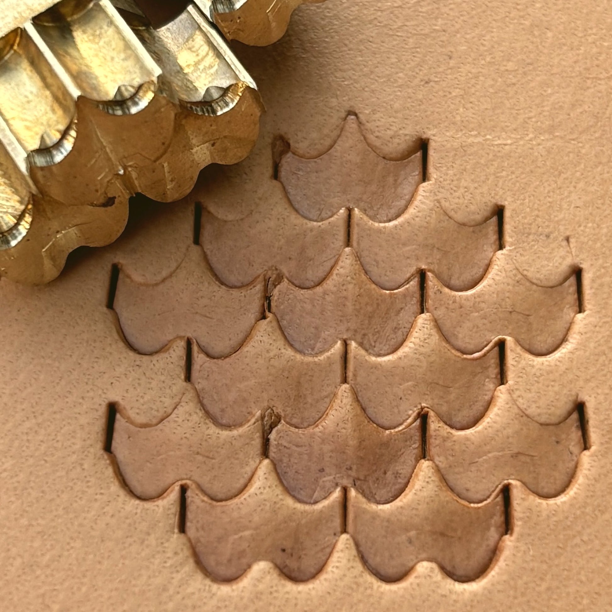 Geometric leather stamp LT408 — brass stamping tool with imprint on natural veg-tan leather