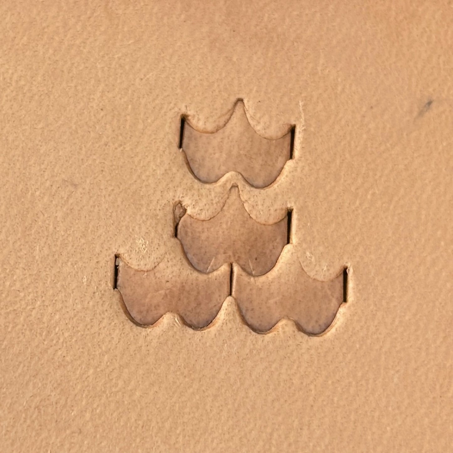 Geometric leather stamp LT408 — single impression on veg-tan leather