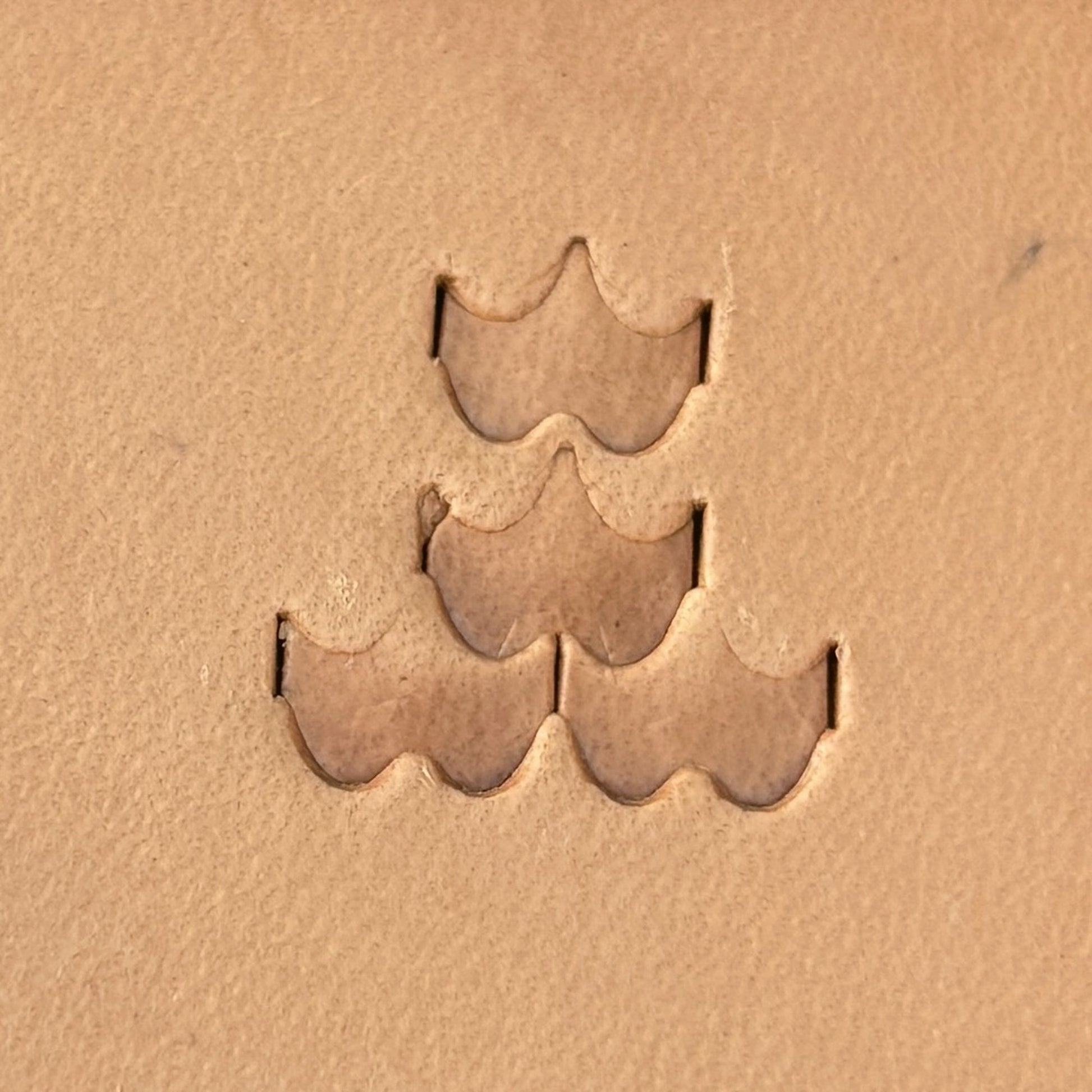 Geometric leather stamp LT408 — single impression on veg-tan leather