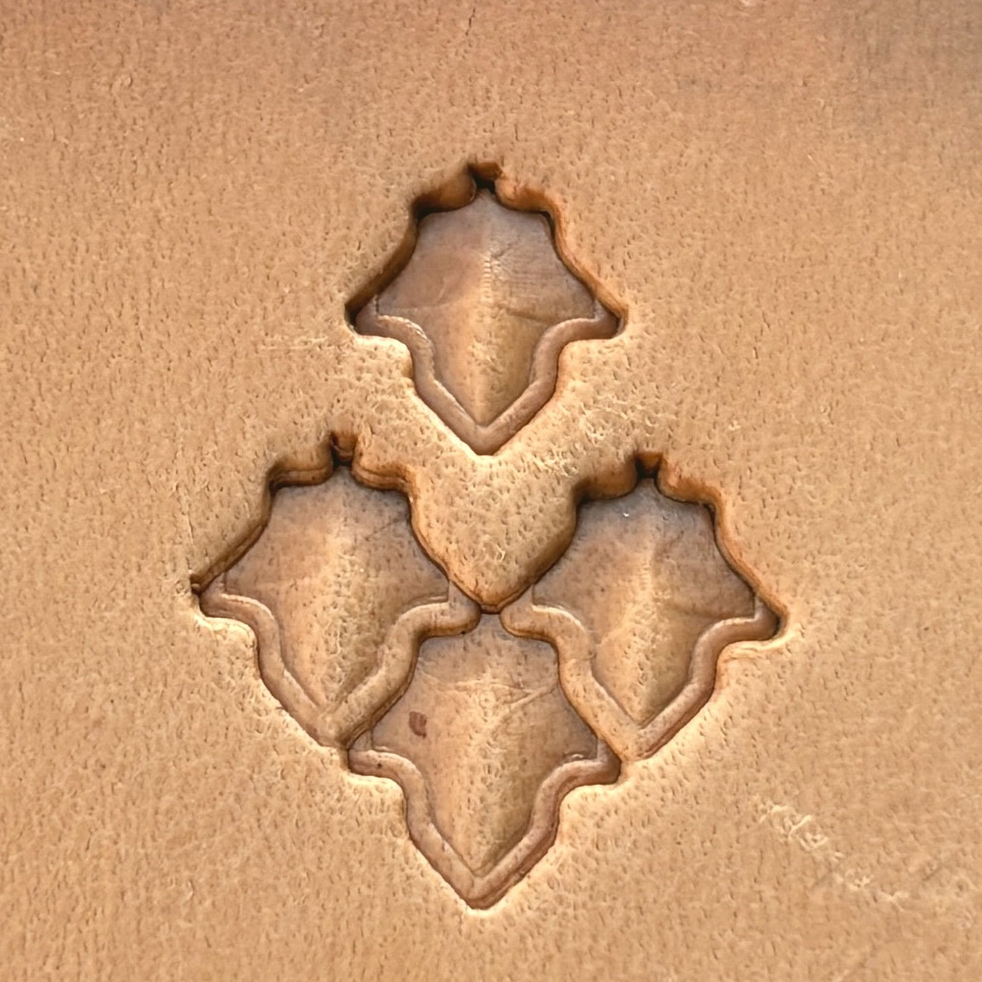 Moroccan Tiles leather stamp LT410 — single impression on veg-tan leather