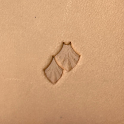 Fan Scales leather stamp LT411 — single impression on veg-tan leather