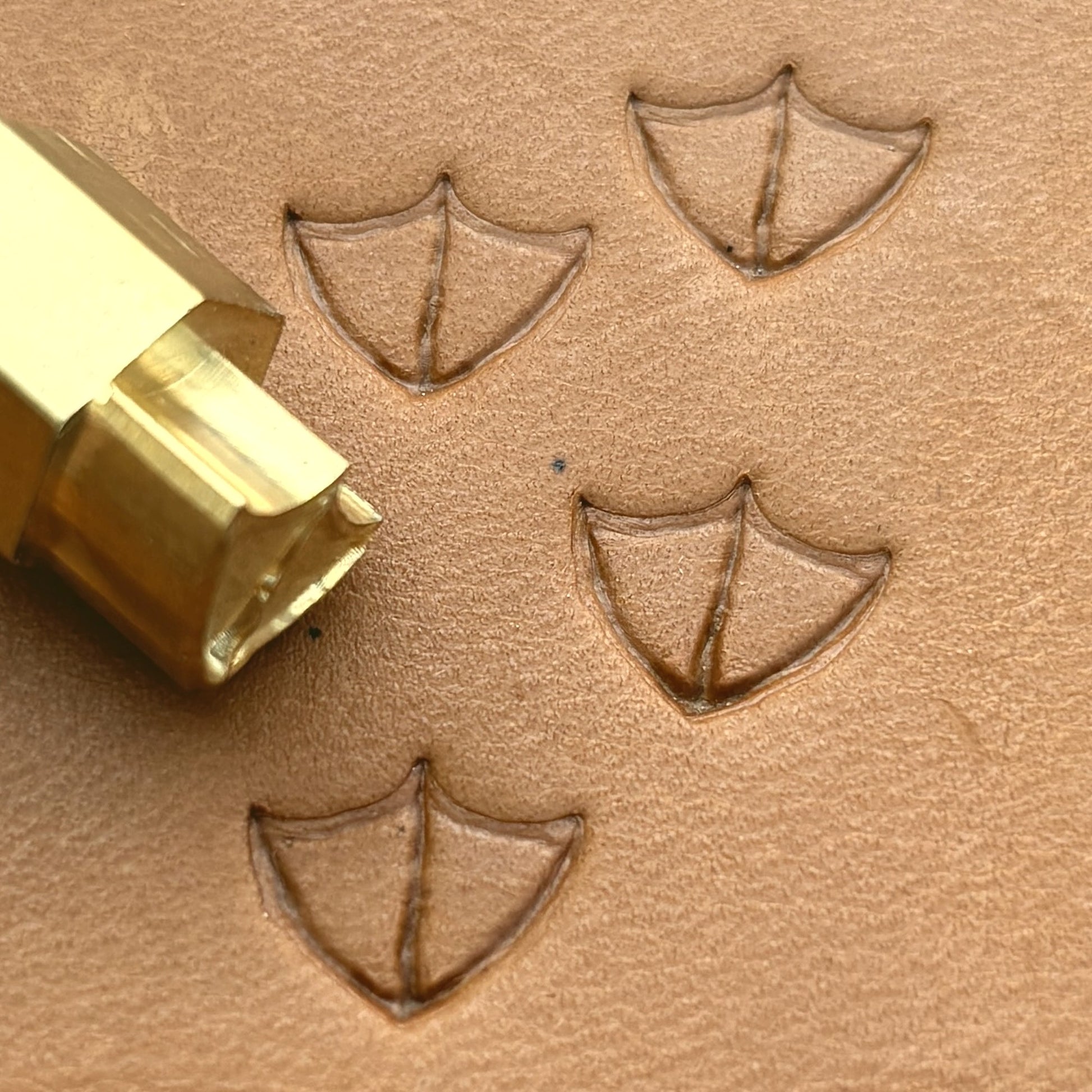 Bird Tracks Footprint leather stamp LT414 — brass stamping tool with imprint on natural veg-tan leather