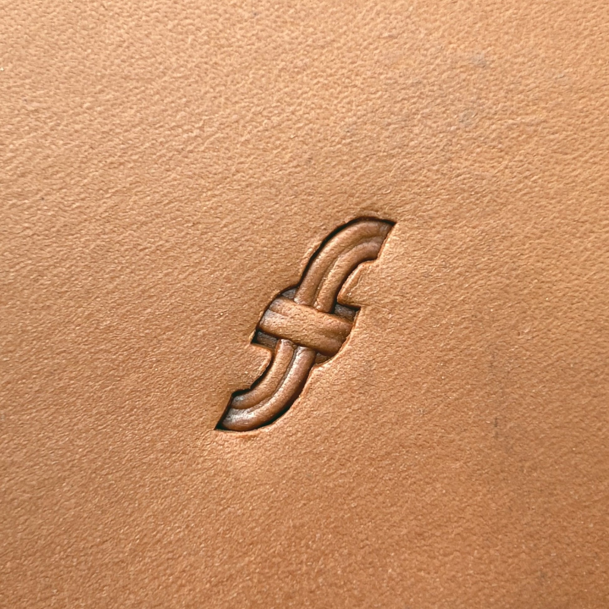 Curved Line Basket Weave leather stamp LT418 — single impression on veg-tan leather
