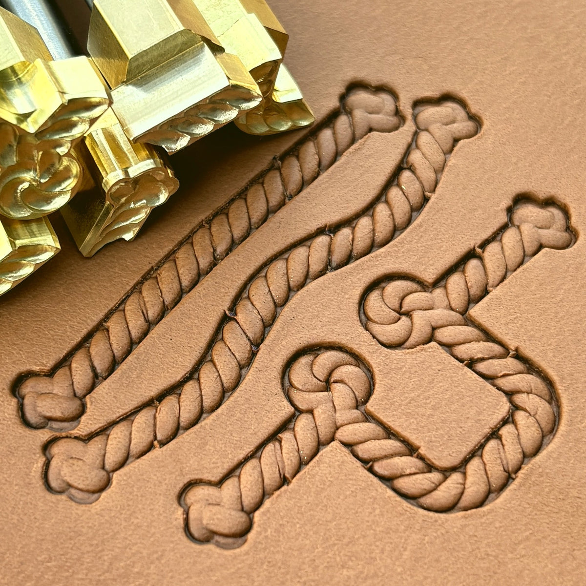Knotted Rope leather stamp set LT424, brass stamps shown with their impressions on leather