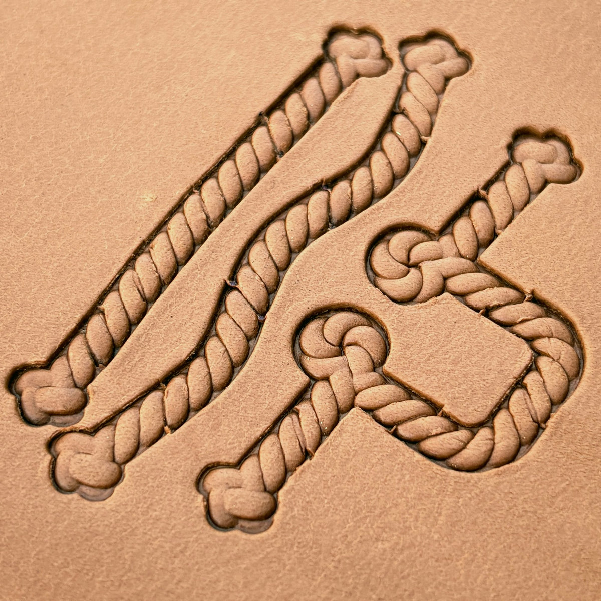 Knotted Rope leather stamp set LT424, straight runs, corners and ends combined into a border on leather