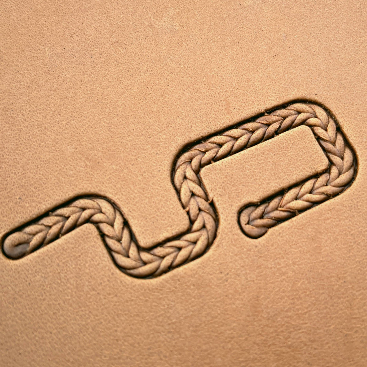 Fine Herringbone Braid leather stamp set LT426, straight runs, corners and ends combined into a border on leather