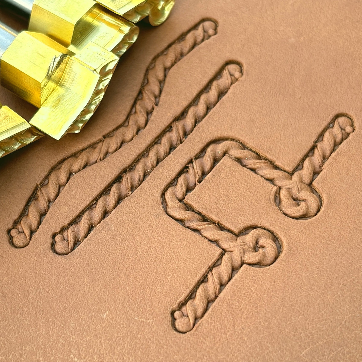 Fine Cord Rope leather stamp set LT427, brass stamps shown with their impressions on leather