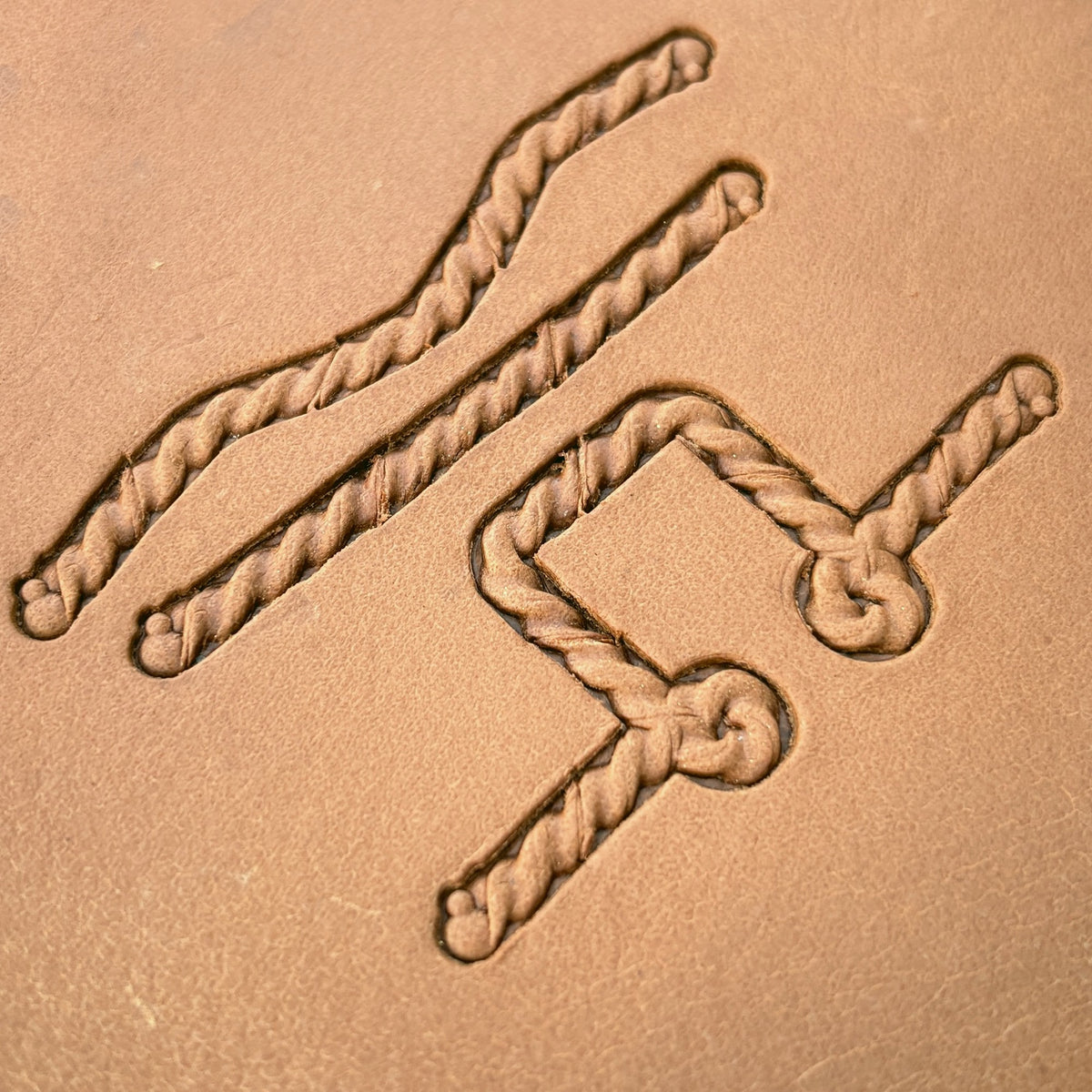 Fine Cord Rope leather stamp set LT427, straight runs, corners and ends combined into a border on leather