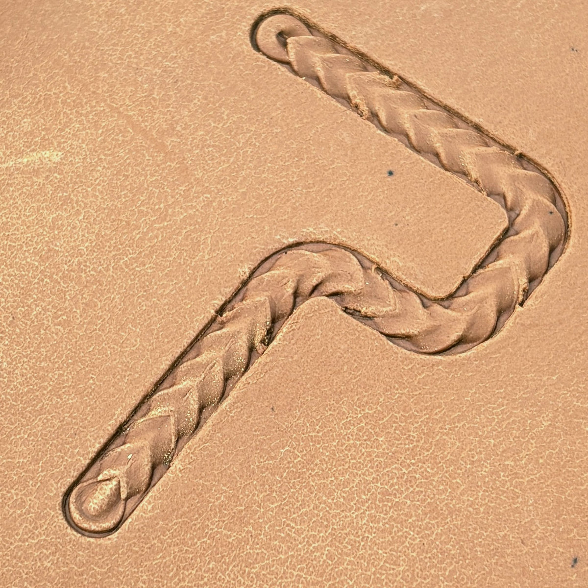 Wide Herringbone Braid leather stamp set LT429, straight runs, corners and ends combined into a border on leather