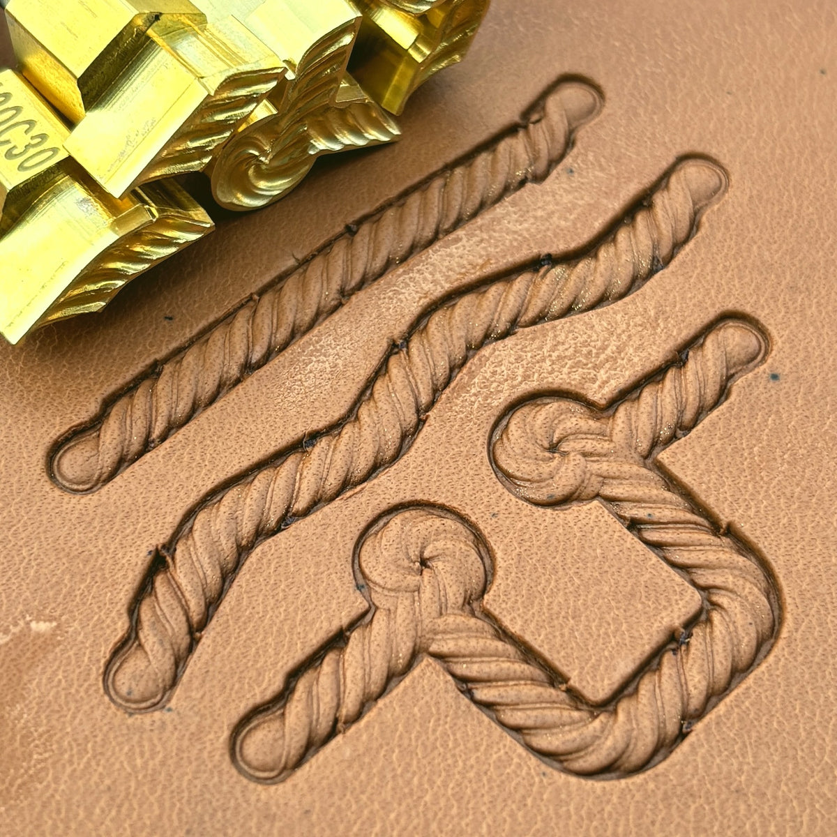Fibre-Twist Rope leather stamp set LT430, brass stamps shown with their impressions on leather